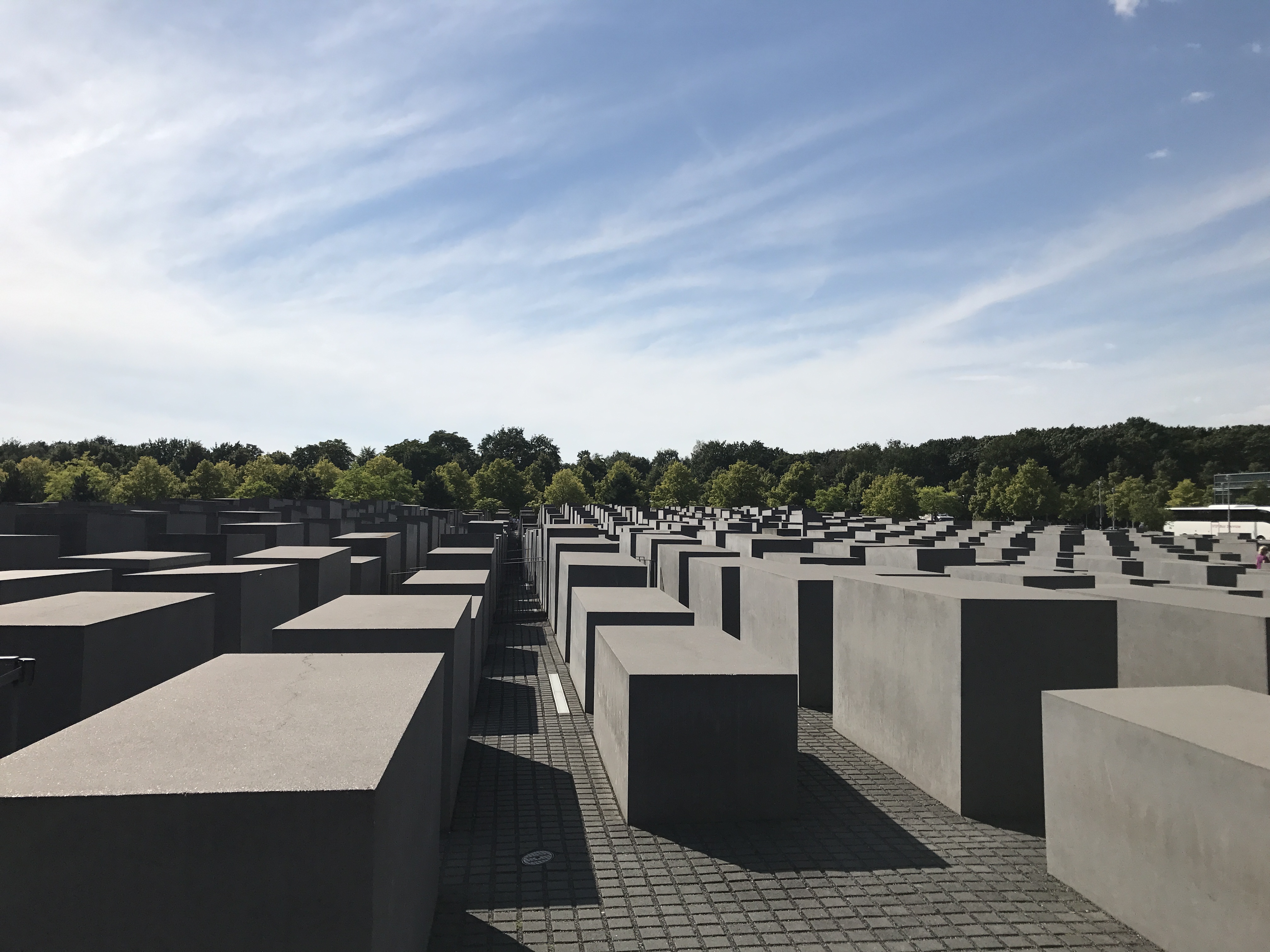 The Memorial to the Murdered Jews of Europe. The meaning of the design is meant to be open to interpretation and the number of blocks is not representative of anything, it’s just what fit there. For reference, it’s okay to sit on them, as approved by the Jewish architect of this memorial. It is not, however, okay to stand on them.