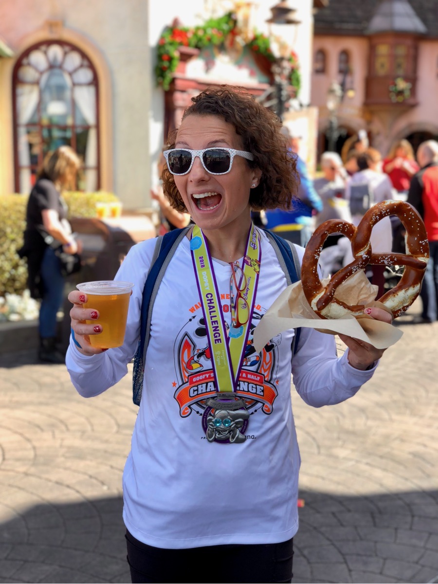 Amelia with a pretzel and beer