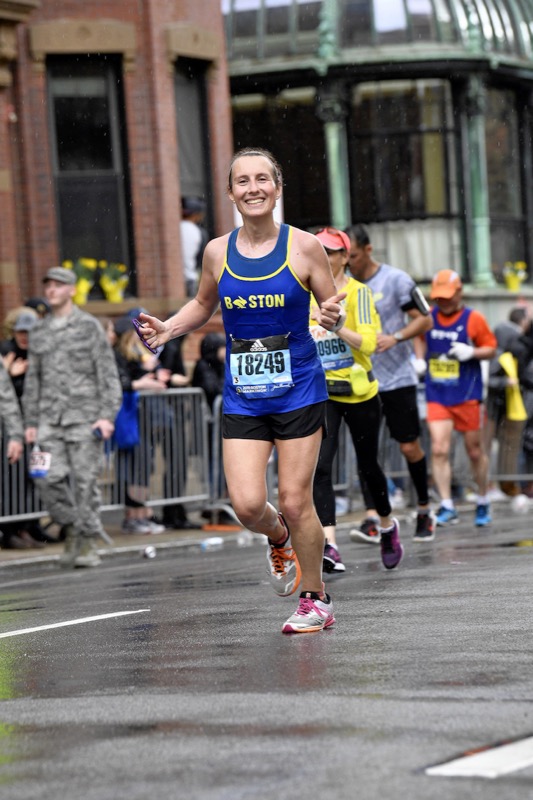 Amelia running with thumbs up